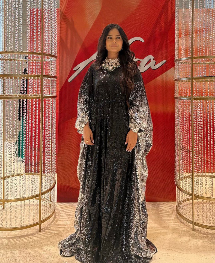 Niki Shah wearing a fashion outfit, styled editorial look